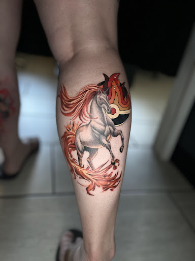 Explore taz tattoo ideas, creative tattoo ideas in Cadillac, available at Limitless Ink Tattoo Studio