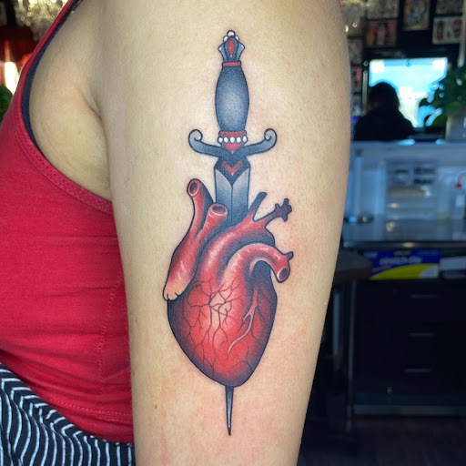 Explore wildflower tattoo ideas, creative tattoo ideas in Virginia Beach, available at Studio Evolve