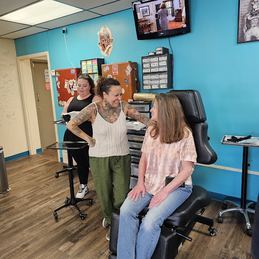 Explore motherhood tattoo ideas, creative tattoo ideas in Traverse City, available at Pinups & Needles