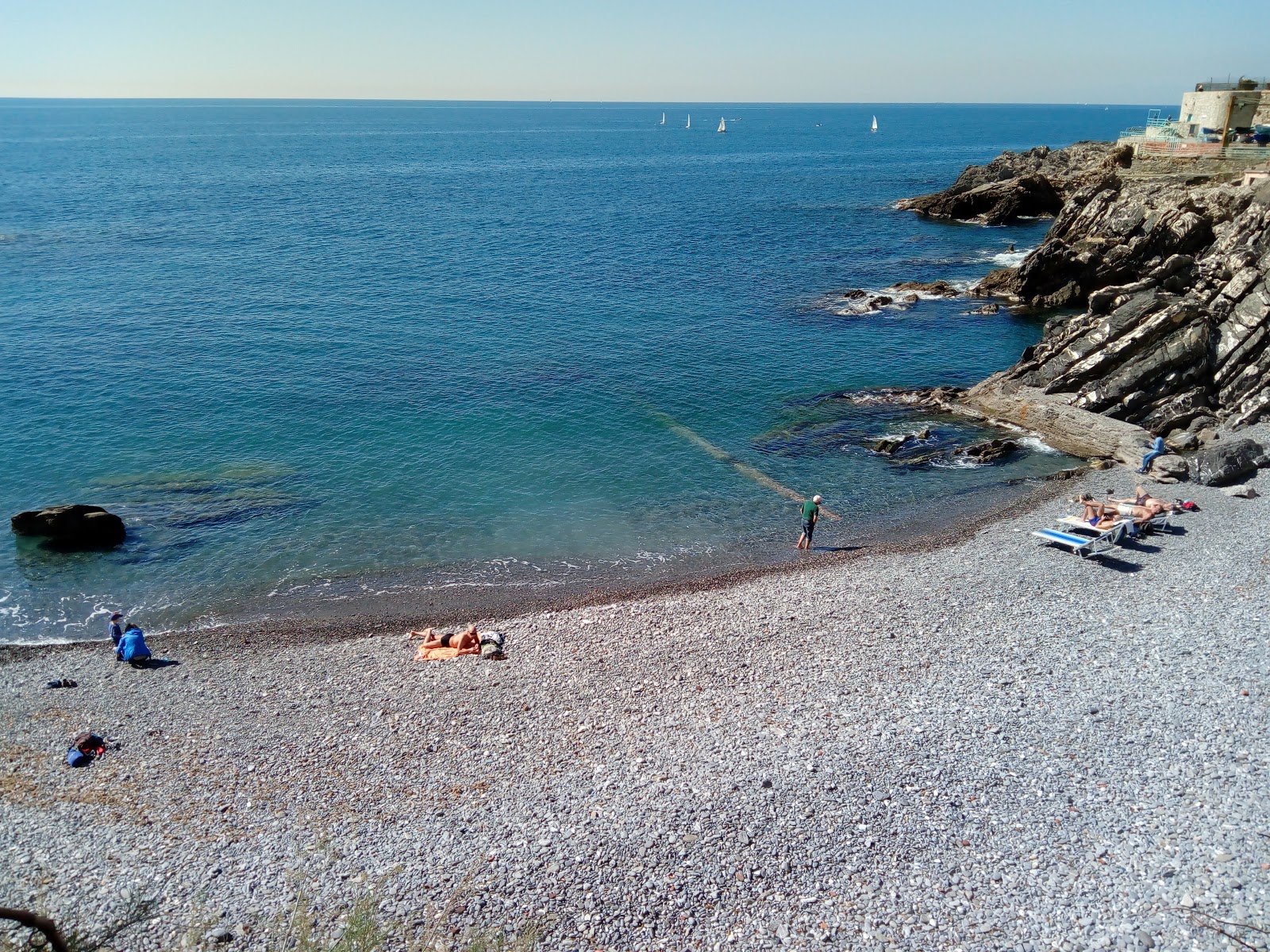 Foto van Gianelli beach met blauw water oppervlakte