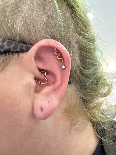 Explore cool neck tattoo ideas, creative tattoo ideas in Orange, available at Baron Art Tattoo