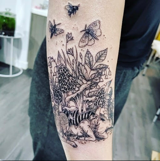 Explore aladdin tattoo ideas, creative tattoo ideas in Fayetteville, available at Stigma Ink Tattoo & Piercing Studio
