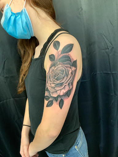 Explore pink ribbon tattoo ideas, creative tattoo ideas in Wentzville, available at Ultimate Art Form Tattoo Studio