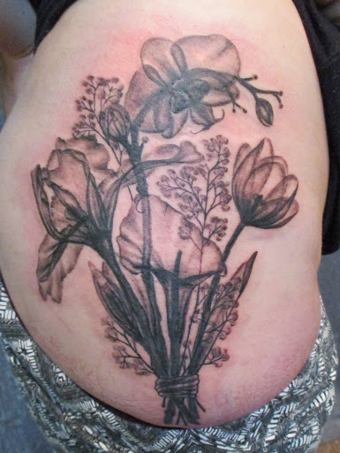 Explore triple moon tattoo ideas, creative tattoo ideas in Oshkosh, available at 920 Tattoo Company LLC