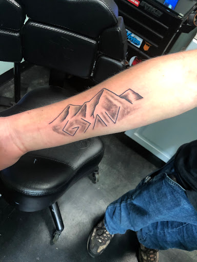 Explore memorial cross tattoo ideas, creative tattoo ideas in Meridian, available at Creative Pain Tattoo Studio
