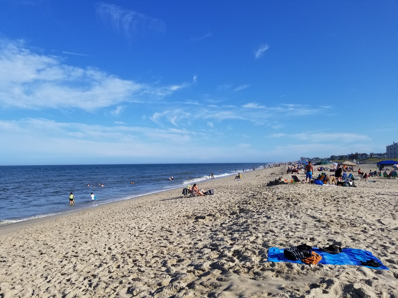 Fotografie cu Dewey Beach cu o suprafață de nisip beige