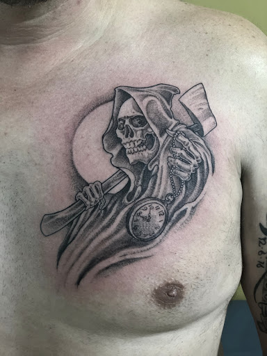 Explore mic tattoo ideas, creative tattoo ideas in Orange, available at North Quabbin Tattoo