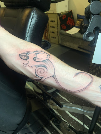 Explore mens upper back tattoo ideas, creative tattoo ideas in Renton, available at Rum Thai Tattoo