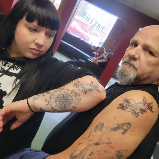 Explore dark hand tattoo ideas, creative tattoo ideas in Portsmouth, available at Shamrock Tattoos & Fine Art Gallery