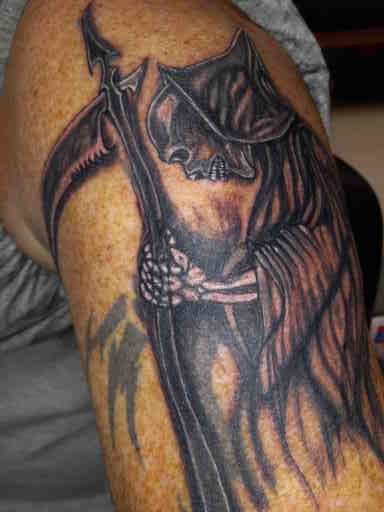 Explore leg tattoo ideas black male, creative tattoo ideas in Roanoke Rapids, available at Greatful deadication tattoo and piercings