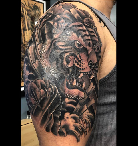 Explore tattoo ideas back arm, creative tattoo ideas in Memphis, available at Studio 42