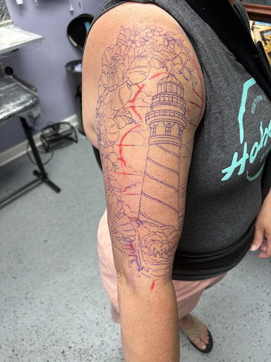 Find bracelet tattoo ideas for females for your next unique tattoo in Edgewood at Tattoo Tattoo MD