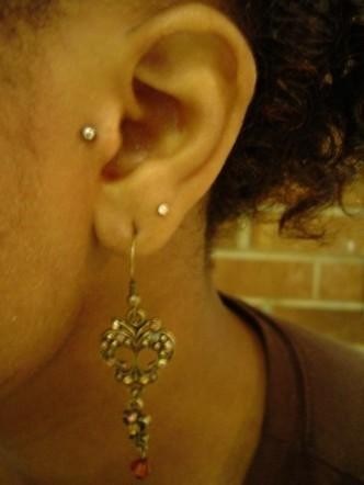 Find clouds tattoo ideas for your next unique tattoo in Greensboro at Piercings by Jill