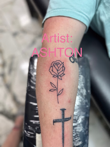 Explore miami dolphins tattoo ideas, creative tattoo ideas in Foley, available at Symbolic Ink Tattoo Studio