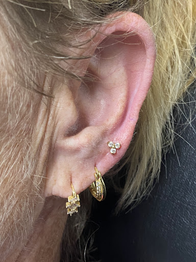 Explore shell tattoo ideas, creative tattoo ideas in Oswego, available at Bodified