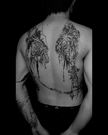 Explore disturbed tattoo ideas, creative tattoo ideas in Kent, available at Defiance Tattoos