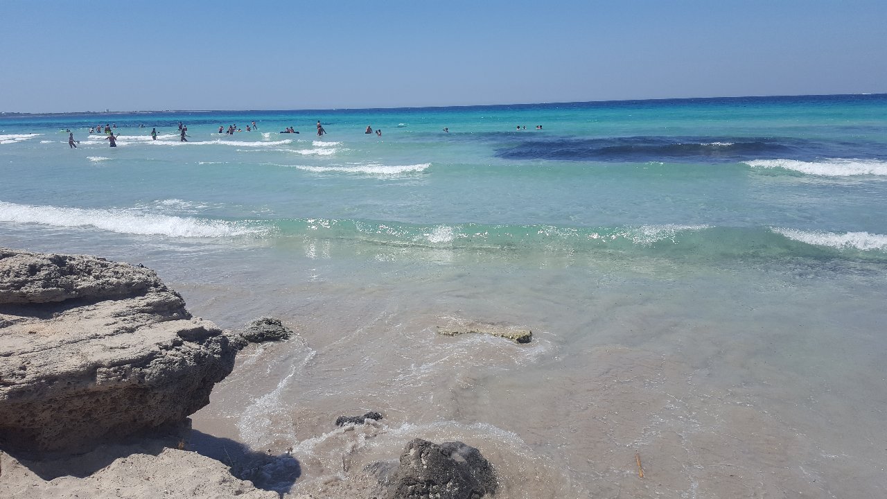 Fotografie cu Spiaggia degli Innamorati cu drept și lung