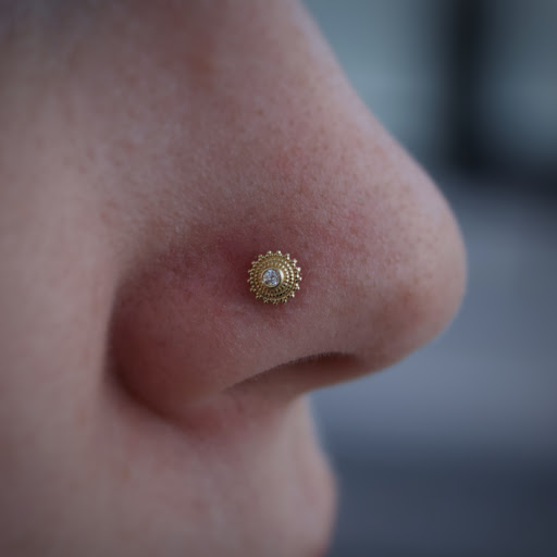 Explore small money tattoo ideas, creative tattoo ideas in Corona Del Mar, available at Rainbow Piercing & Jewelry