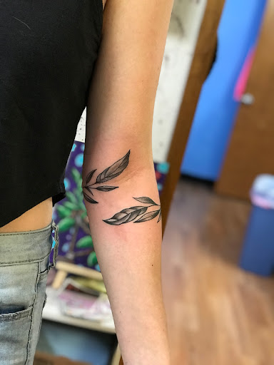 Explore breast cancer tattoo ideas, creative tattoo ideas in Milwaukee, available at West Allis Tattoo & Gallery Tattoo Shop Milwaukee