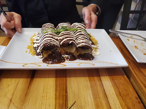 Latin American Restaurant «De La Vega Restaurante y Galeria», reviews and photos, 128 N Woodland Blvd, DeLand, FL 32720, USA