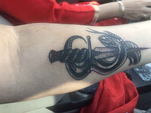 Explore memorial cross tattoo ideas, creative tattoo ideas in Durham, available at Skin City Body Art