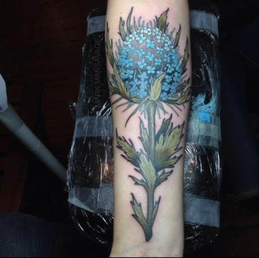 Explore rebirth tattoo ideas, creative tattoo ideas in Stevens Point, available at Black Rabbit Tattooing