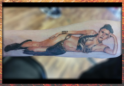 Explore slave tattoo ideas, creative tattoo ideas in Omaha, available at Eternal Tattoo & Body Piercing - Omaha