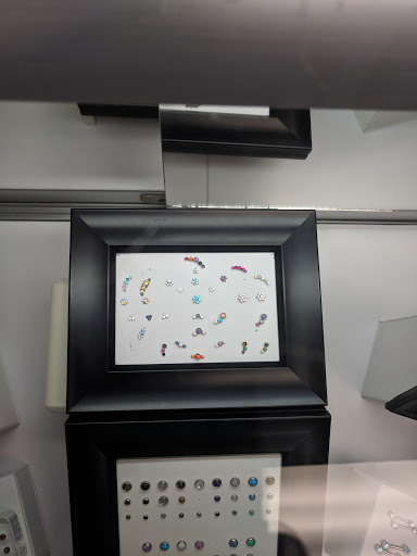 Explore peach tattoo ideas, creative tattoo ideas in Charleston, available at MOLA Piercing and Fine Jewelry