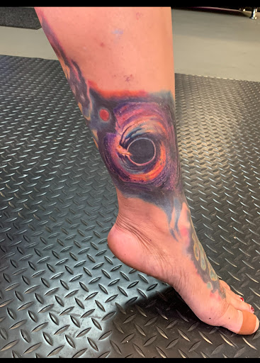Explore portal tattoo ideas, creative tattoo ideas in Spring, available at Art Immortal Woodlands Tattoo and Piercing
