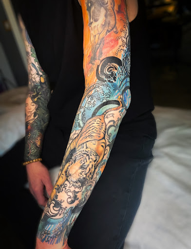 Explore grinch tattoo ideas, creative tattoo ideas in Los Angeles, available at Ravens Nest Tattoo