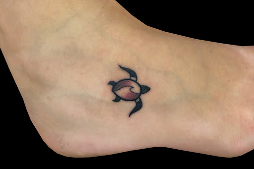 Explore simple leg tattoo ideas, creative tattoo ideas in Lahaina, available at Sweet Trade Tattoo
