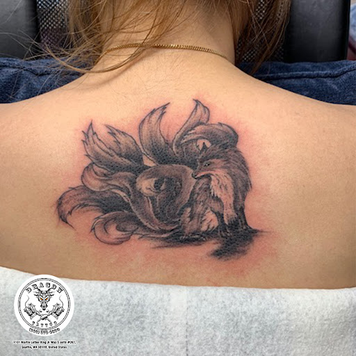 Explore cover up tattoo ideas on forearm, creative tattoo ideas in Seattle, available at Dragon Tattoo