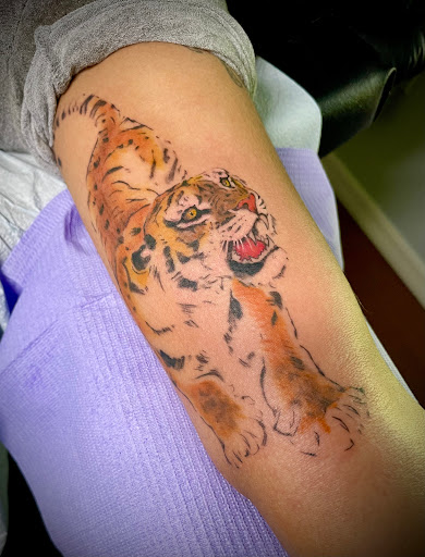 Find surrealism tattoo ideas for your next unique tattoo in Tampa at Shades of Blak Studios LLC