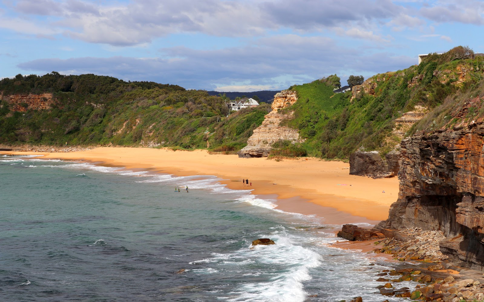 Foto de Turimetta Beach con arena beige superficie