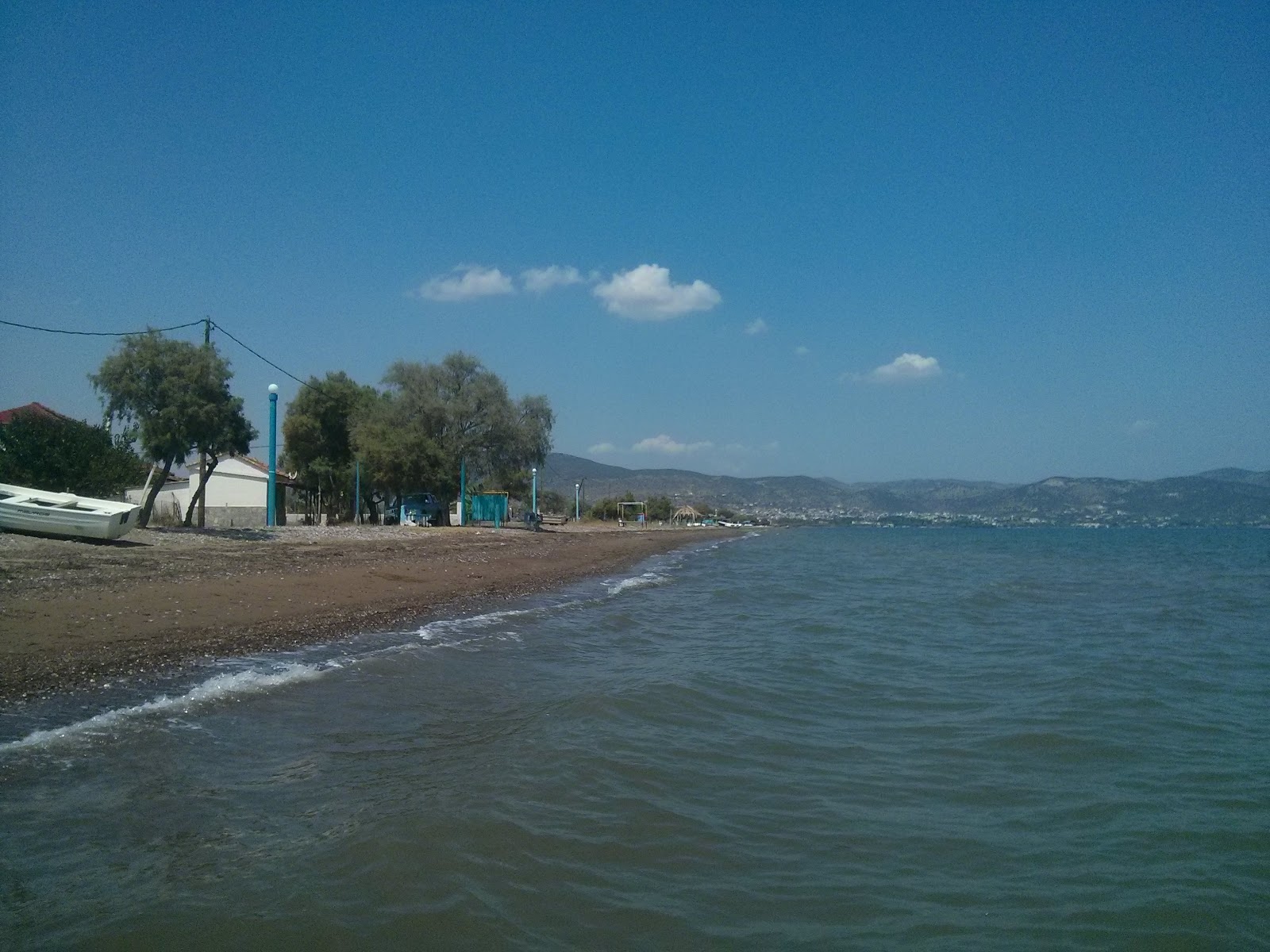 Foto di Dimitriada beach con parzialmente pulito livello di pulizia