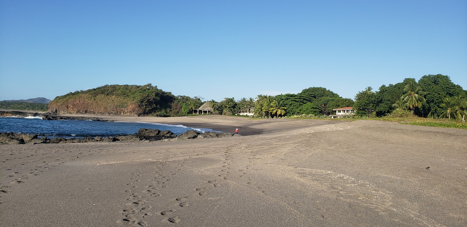 Foto von Playa honda mit grauer sand Oberfläche