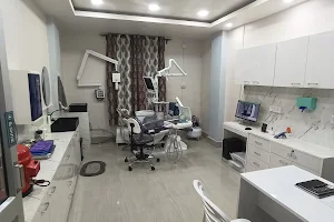 Roots multi-speciality dental care image