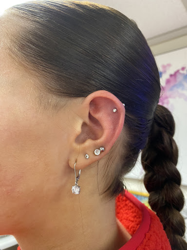 Explore cute behind the ear tattoo ideas, creative tattoo ideas in Vancouver, available at Headstrong Tattoo Studio & Piercing