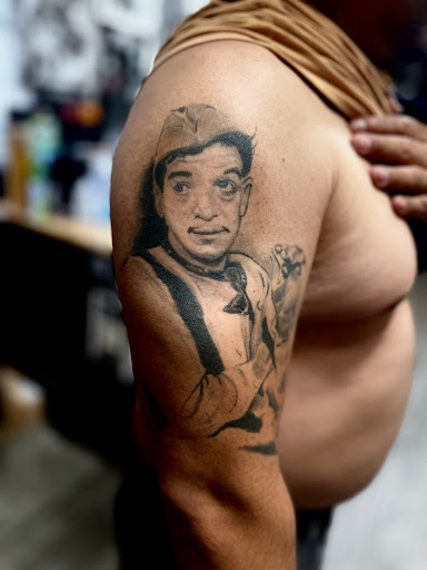 Explore tattoo ideas hood, creative tattoo ideas in Downey, available at Superior Ink Tattoo and Piercings