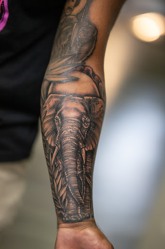 Explore tattoo ideas for women's arms, creative tattoo ideas in Leesville, available at Revolution Ink Tattoo and Art Gallery