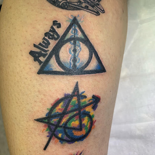 Explore wine tattoo ideas, creative tattoo ideas in Hudson Falls, available at ALTERED ADDICTION TATTOOS