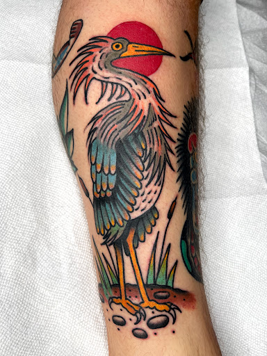 Explore songbird tattoo ideas, creative tattoo ideas in Johnson City, available at Gold Cross Tattoo Co.