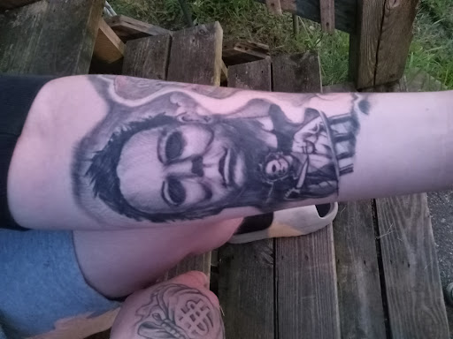 Explore power tattoo ideas, creative tattoo ideas in Roanoke, available at RailYard INK
