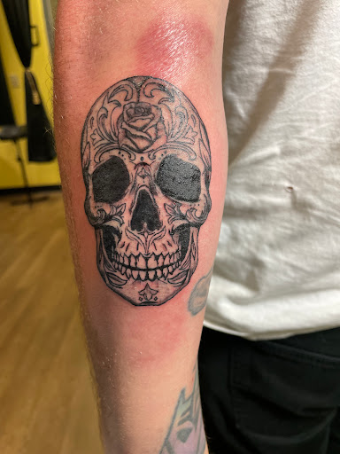 Explore stained glass tattoo ideas, creative tattoo ideas in Roanoke, available at Black Caesar Tattoos & Piercings