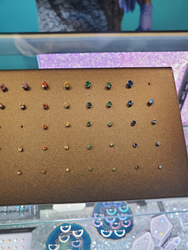 Find tattoo ideas for under the breast for your next unique tattoo in Ann Arbor at Ideal Body Piercing