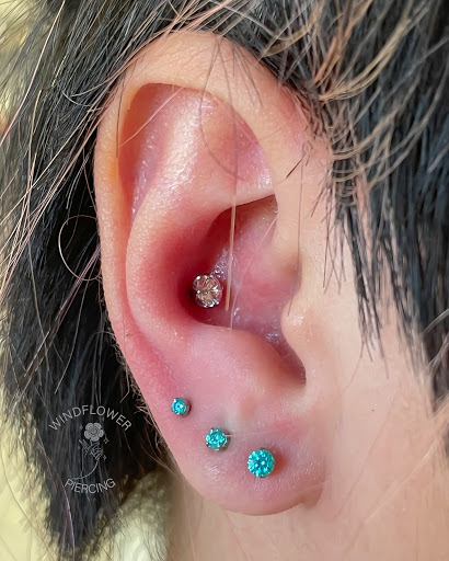 Explore fist bump tattoo ideas, creative tattoo ideas in Fontana, available at Windflower Piercing Studio