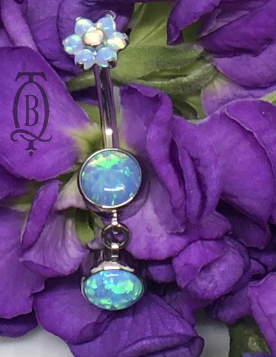 Explore wisdom tattoo ideas, creative tattoo ideas in Marietta, available at The Queen Bee Tattoo and Piercing Parlour