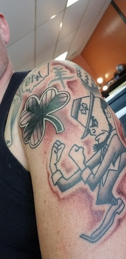 Explore tattoo cover up ideas for upper back, creative tattoo ideas in Fremont, available at Lucky Lukes Tattoo Studio