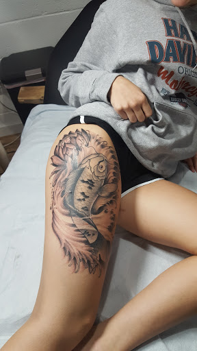 Explore e.t. tattoo ideas, creative tattoo ideas in Virginia Beach, available at World Famous Blue Horseshoe Tattoo and Piercing Independence