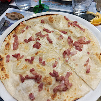 Tarte flambée du Restaurant de spécialités alsaciennes Restaurant Zum Sauwadala à Mulhouse - n°10